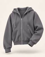 AI-generated product image of the dark gray Everyday Zip Hoodie, partially unzipped with hood folded back against an off-white background